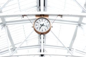 Beautiful analogue clock in station roof